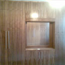 walnut wardrobes by Jake Robinson